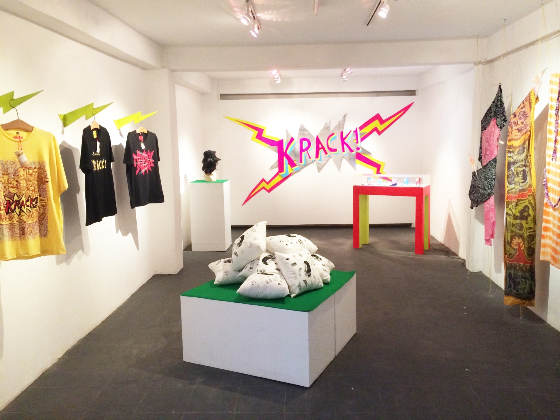 front: Yudha Sandy, The Man Who Sold The World & Angry Young Man (series of brooches, etched brass with enamel) 2014 rear: Hendra 'hehe' Harsono, Toys (paper mache, hand painted) 2014 3 smith